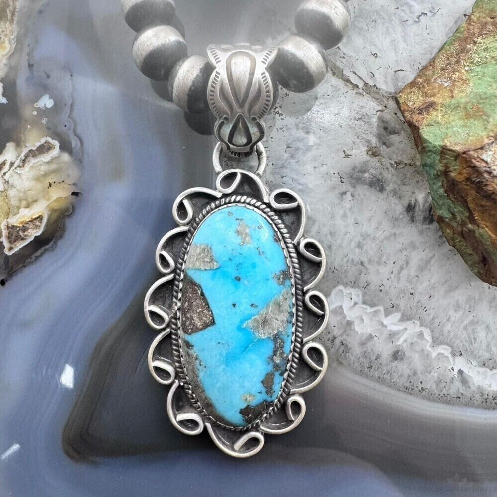 Sterling Southwestern Style Elongated Oval Matrix Turquoise Pendant For Women